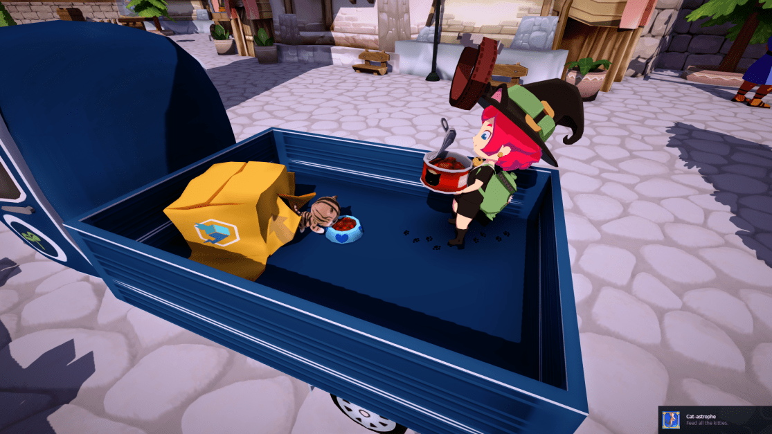 Mika feeding a hungry cat