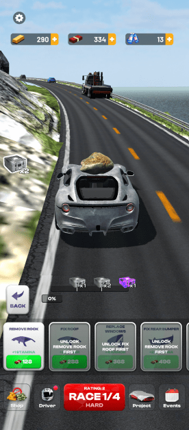 A silver car with a large rock on its roof is centered on a highway running along a coastline. The user interface at the bottom of the screen offers options to "Remove Rock", "Fix Roof," "Replace Windows," and "Fix Rear Bumper." In-game currency totals are displayed at the top, and navigation icons are at the bottom for "Shop," "Driver," "Race," "Project," and "Events."