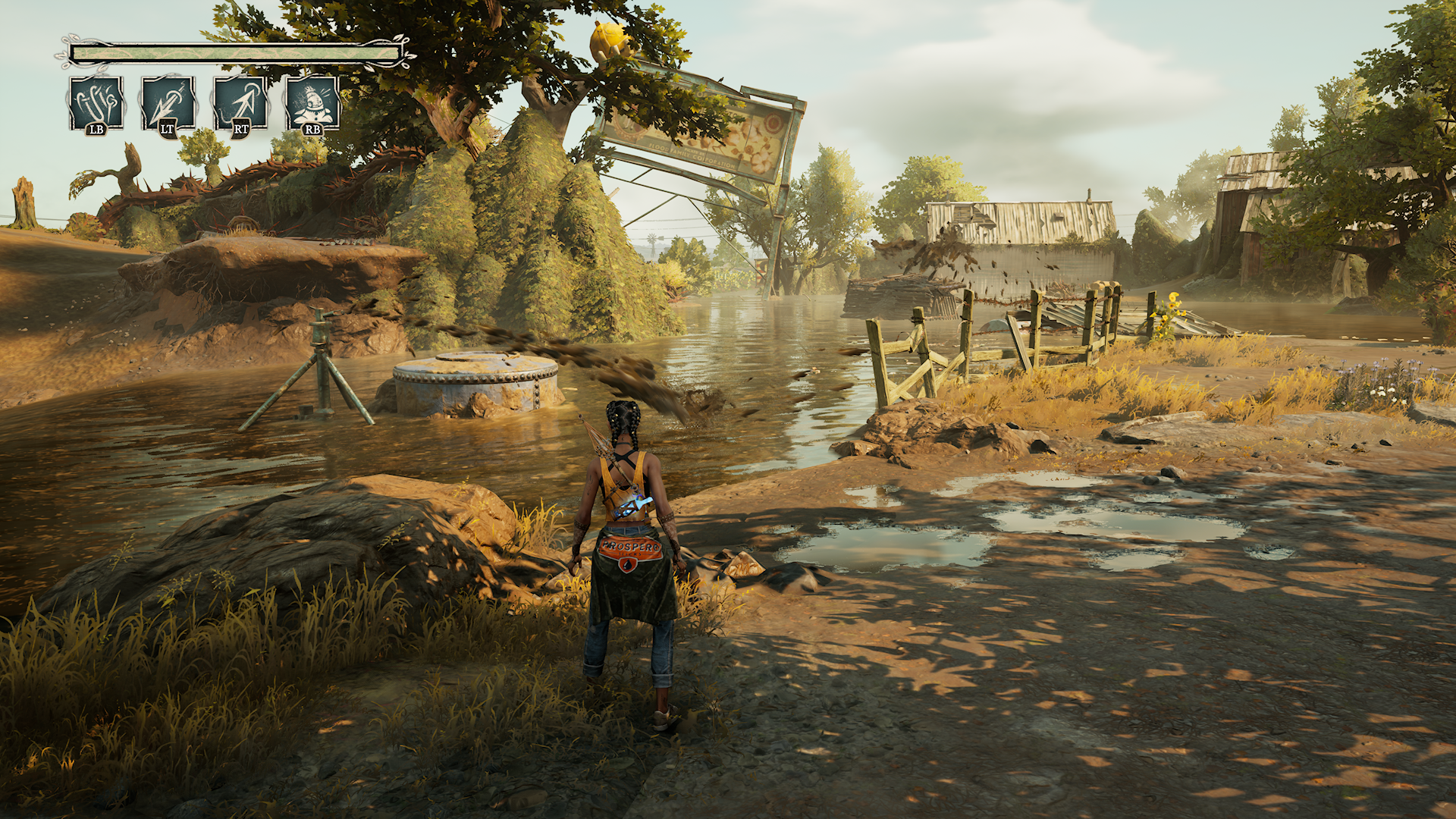 Third-person gameplay screenshot from South of Midnight showing a player character near a swampy riverbank in a post-apocalyptic Southern Gothic setting. The character wears a backpack labeled “PROSPER” and stands amid overgrown vegetation, broken bridges, and abandoned buildings. On-screen UI displays ability controls (LB, LT, RT, RB), highlighting exploration and action mechanics in a richly detailed, atmospheric environment.