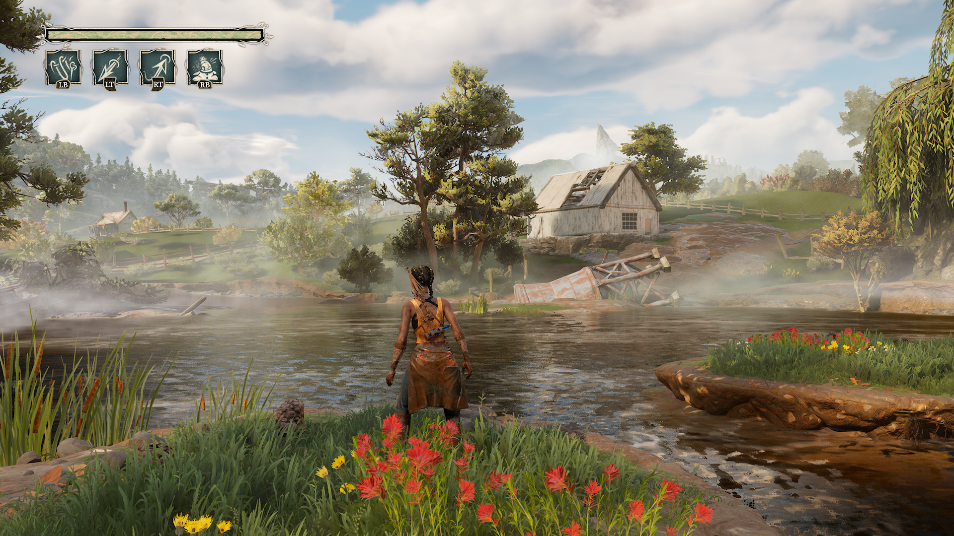Gameplay screenshot from South of Midnight featuring a player character with braided hair standing near a misty riverbank. The character wears a brown outfit and faces a dilapidated white house with a collapsed roof, surrounded by dense trees, red and yellow flowers, and overgrown vegetation. On-screen UI displays ability controls (LB, LT, RT, RB), highlighting action-adventure gameplay and the game’s signature Southern Gothic atmosphere.