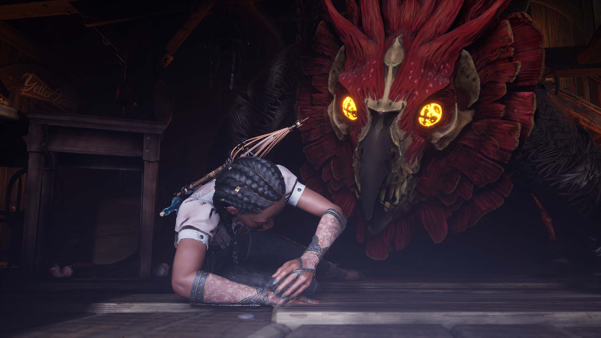 A tense moment from South of Midnight shows a character with braided hair crouched on the ground in a dimly lit room. They wear a white shirt with arm wraps. Looming over them is a large, eerie creature with glowing yellow eyes and a red, feathered head, its face inches away from the character’s. The dramatic lighting and close proximity create a sense of danger and suspense.